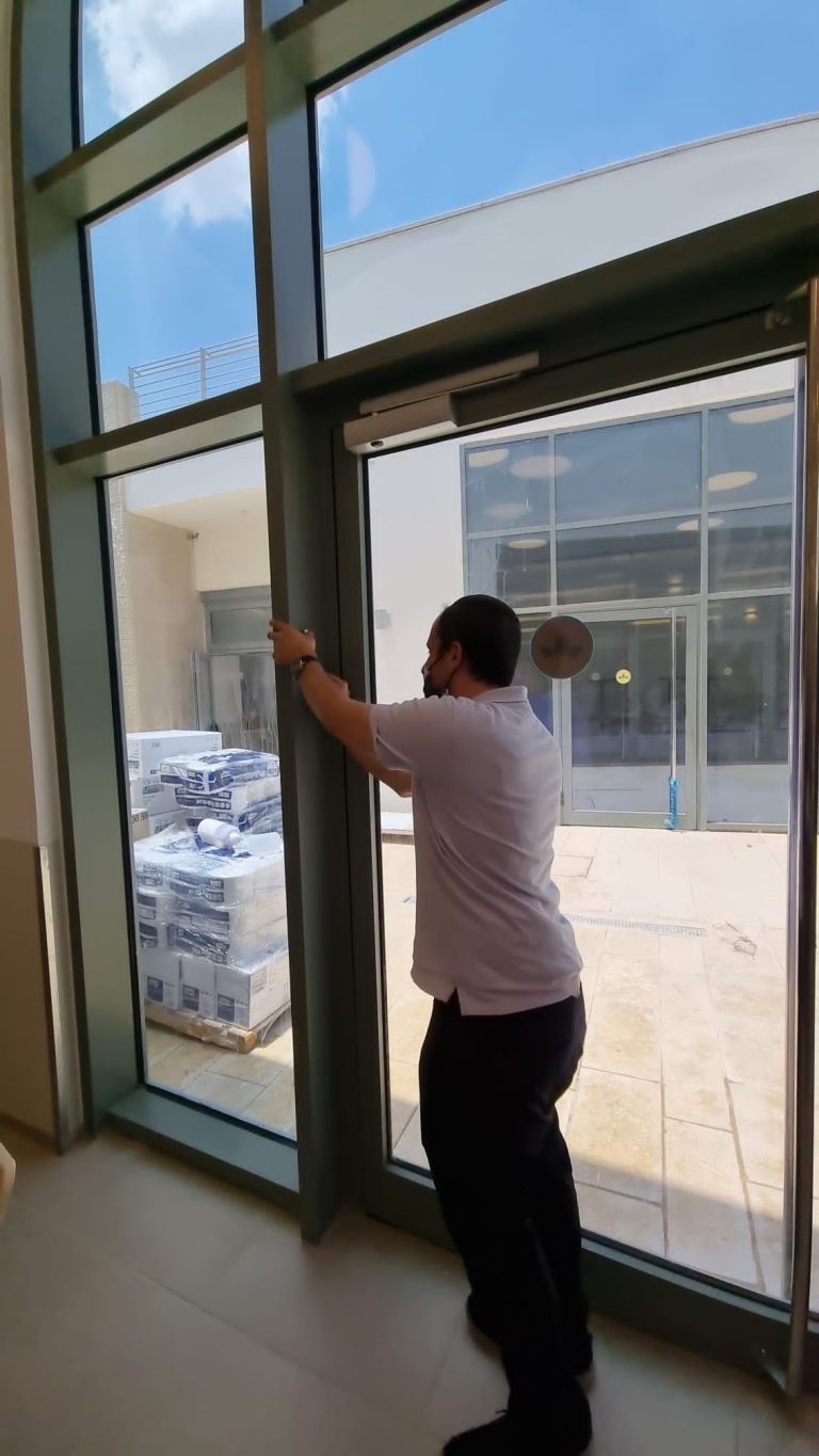 Putting up a mezuzah at the hospital קובעים מזוזה בבית חולים